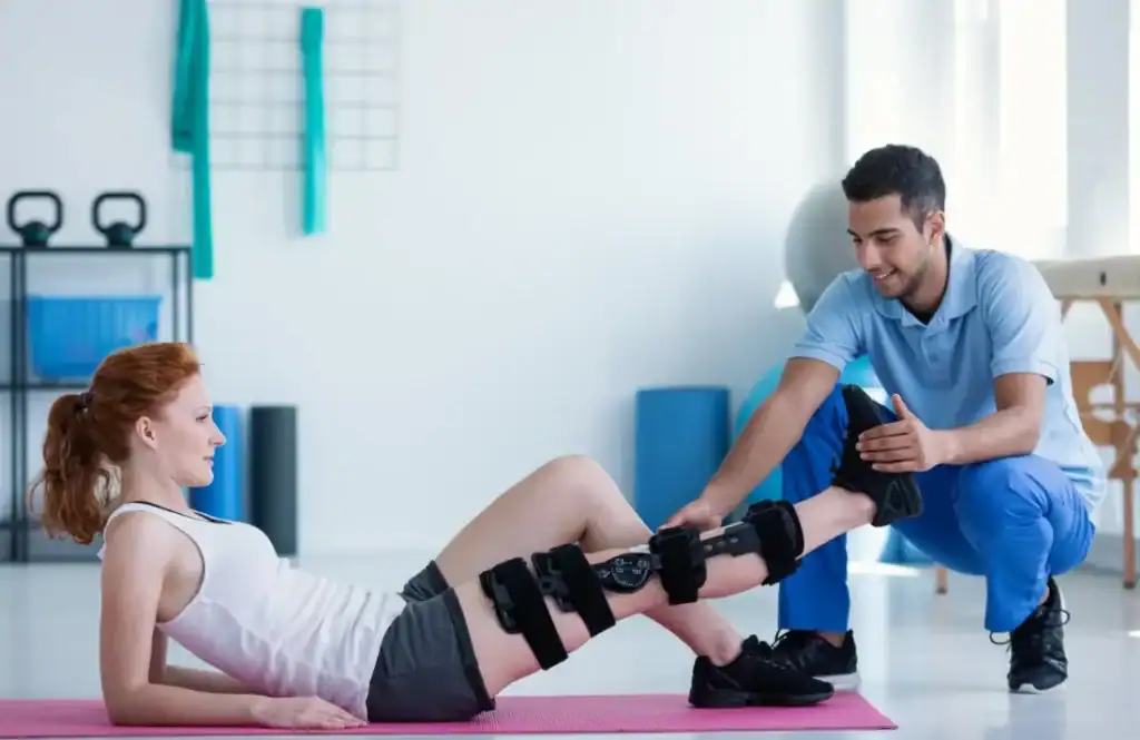 Debunking Meal Timing Myths: The Truth About Muscle Recovery 1 Woman having treatment to help muscle recovery Hatfield after an injury